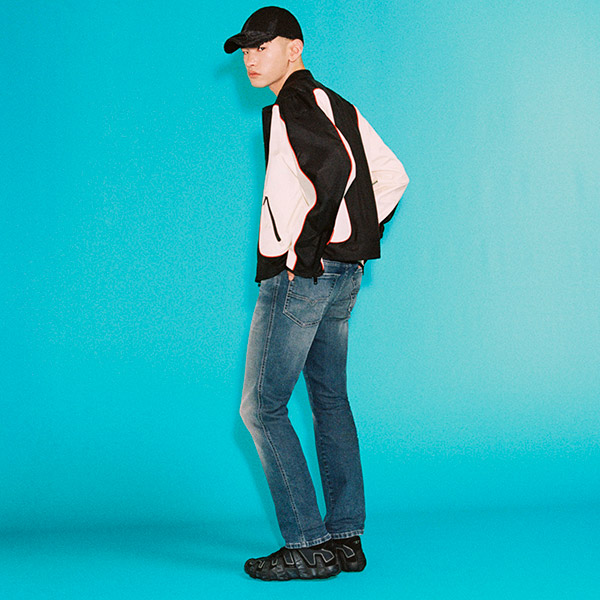 A man wearing a pair of Diesel slim jeans