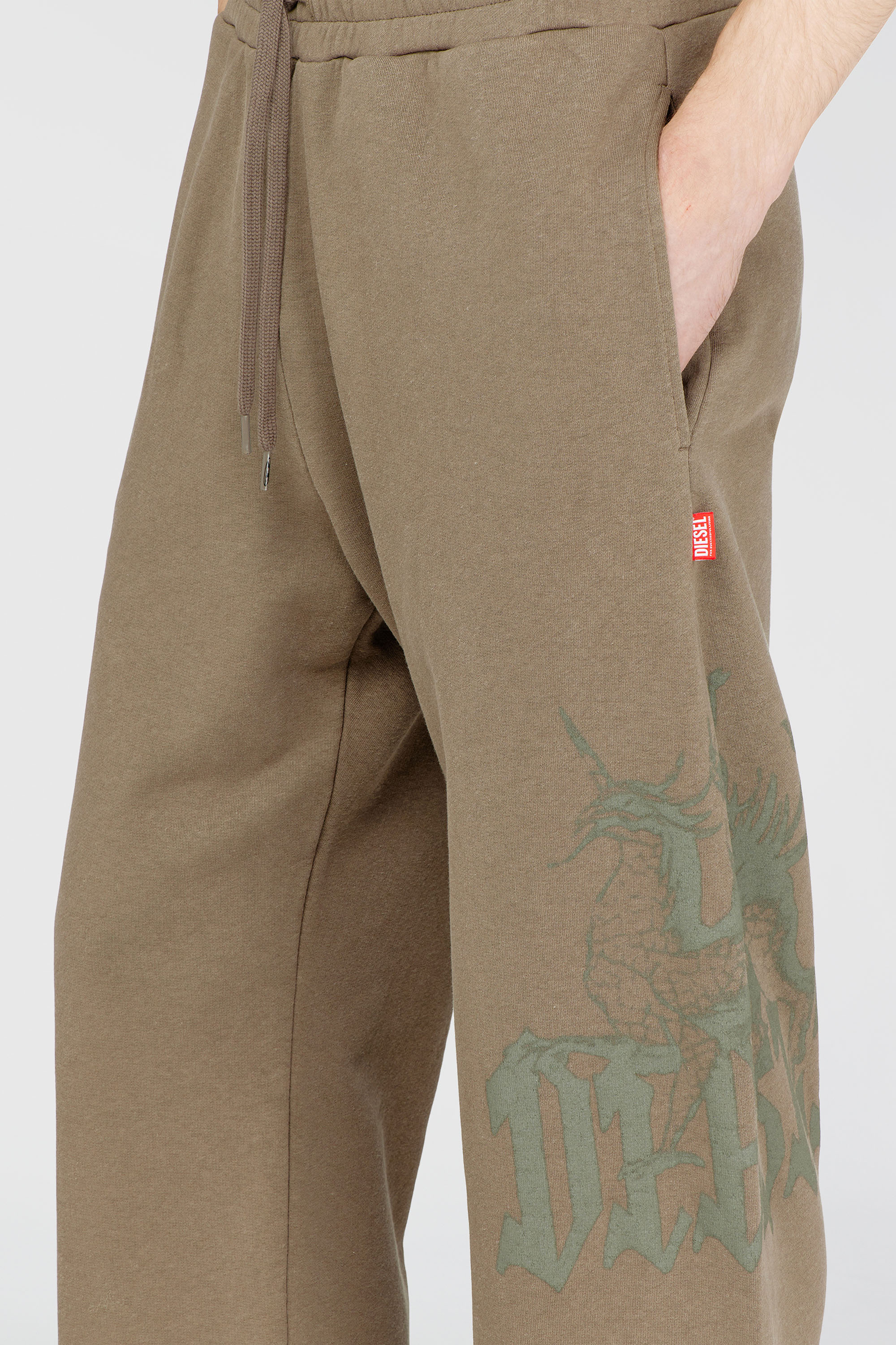 Diesel - P-GRO, Man's Treated pants with logo print in Brown - 5